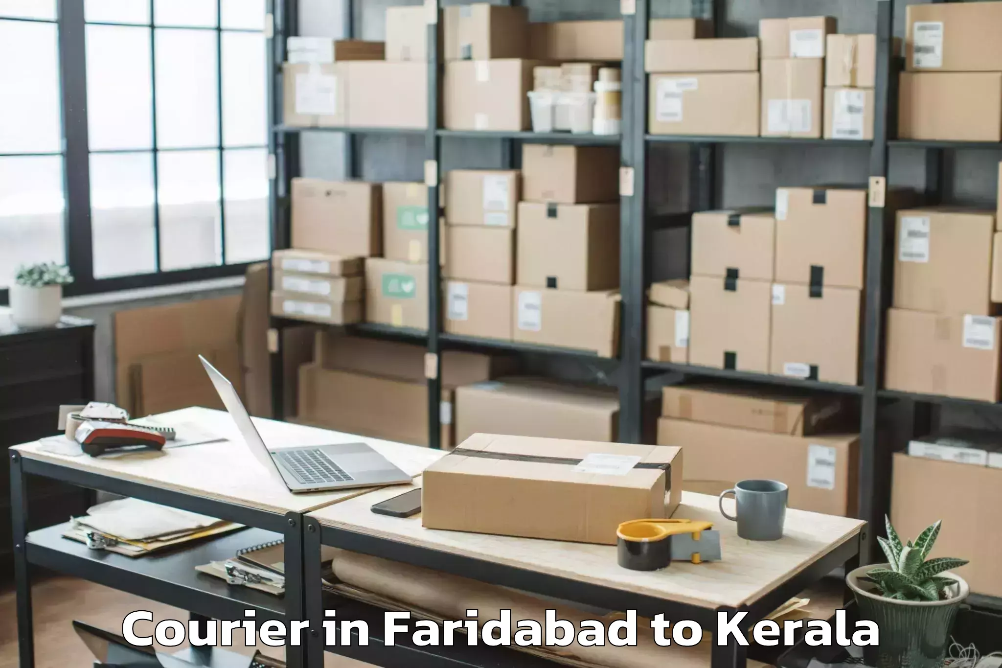 Book Faridabad to Ezhupunna Courier